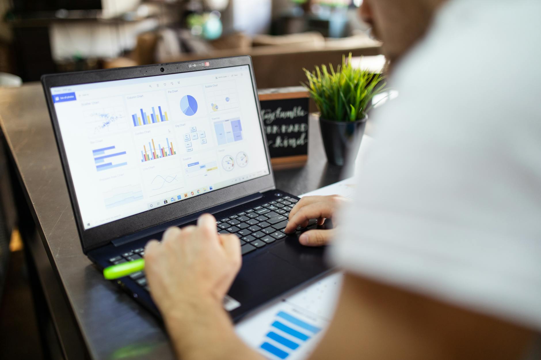 Financial spreadsheet on a warm wooden desk
