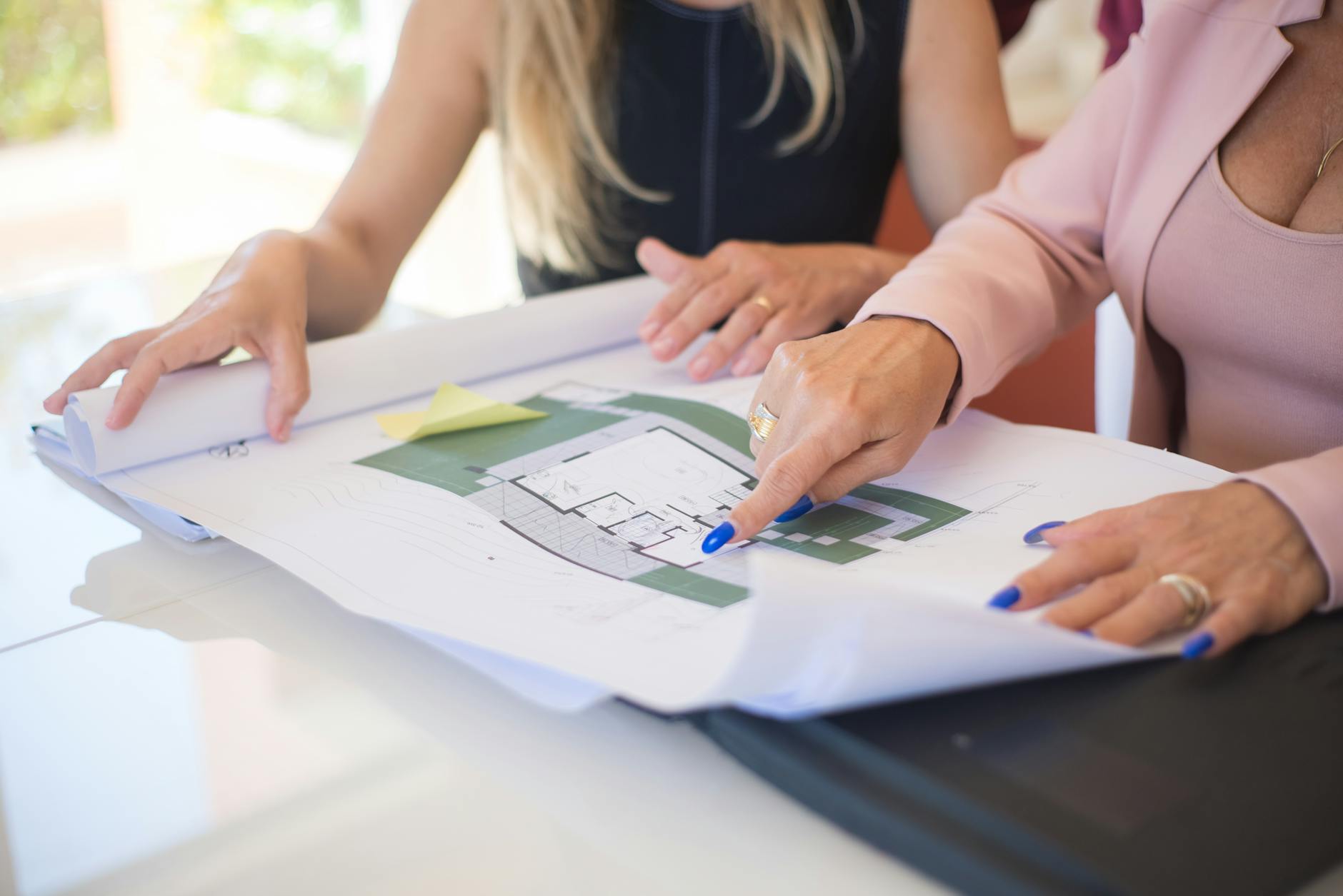 Architects discussing plans at a decision meeting